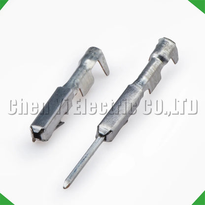 Wire crimp pins for automotive connector sheath