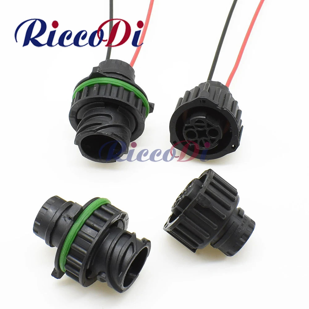 Automotive waterproof AC connector assembly with female and male sockets for vehicle electrical systems