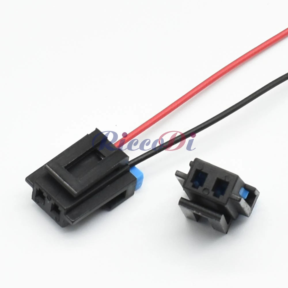 Close-up of automotive 1.5mm wire connector showing secure waterproof male and female socket interface