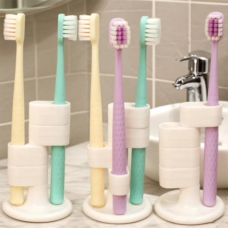 Close-up of rotating toothbrush holder, desktop organizer for toothbrushes and makeup brushes, convenient bathroom accessory