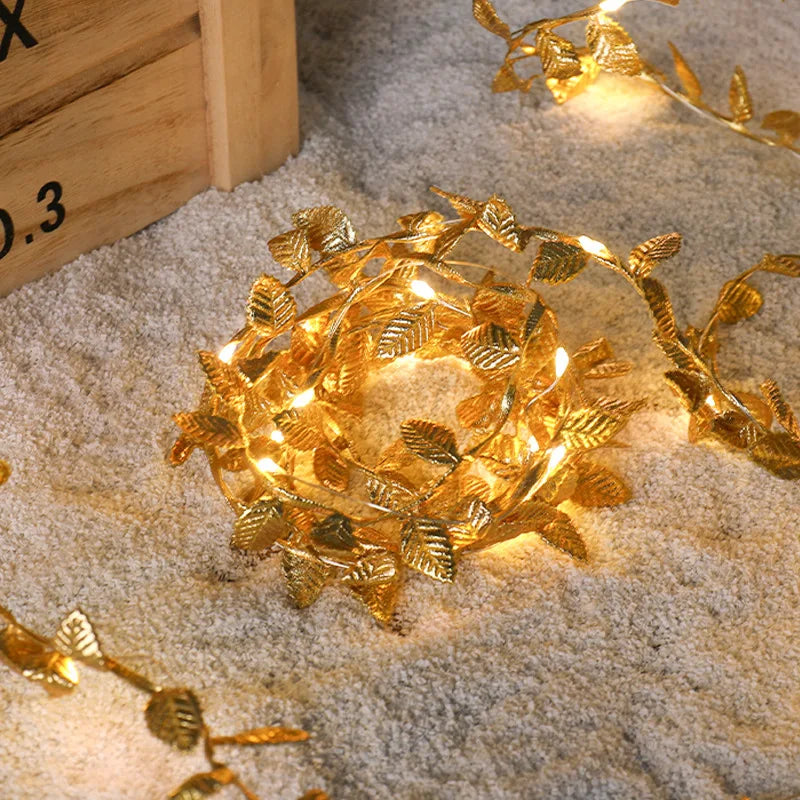Close-up of golden leaves LED fairy lights, battery powered for festive home decor and DIY wreaths