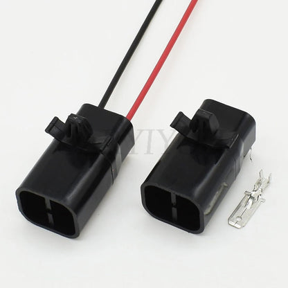 Black 2 pin male automotive connector installed in vehicle electrical system for secure and stable wiring
