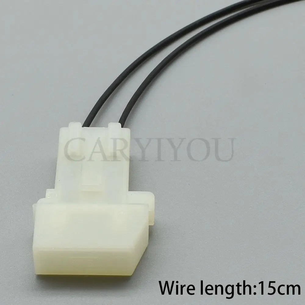Close-up view of 2-pin terminal on blue medium blade automotive fuse holder for stable electrical contact