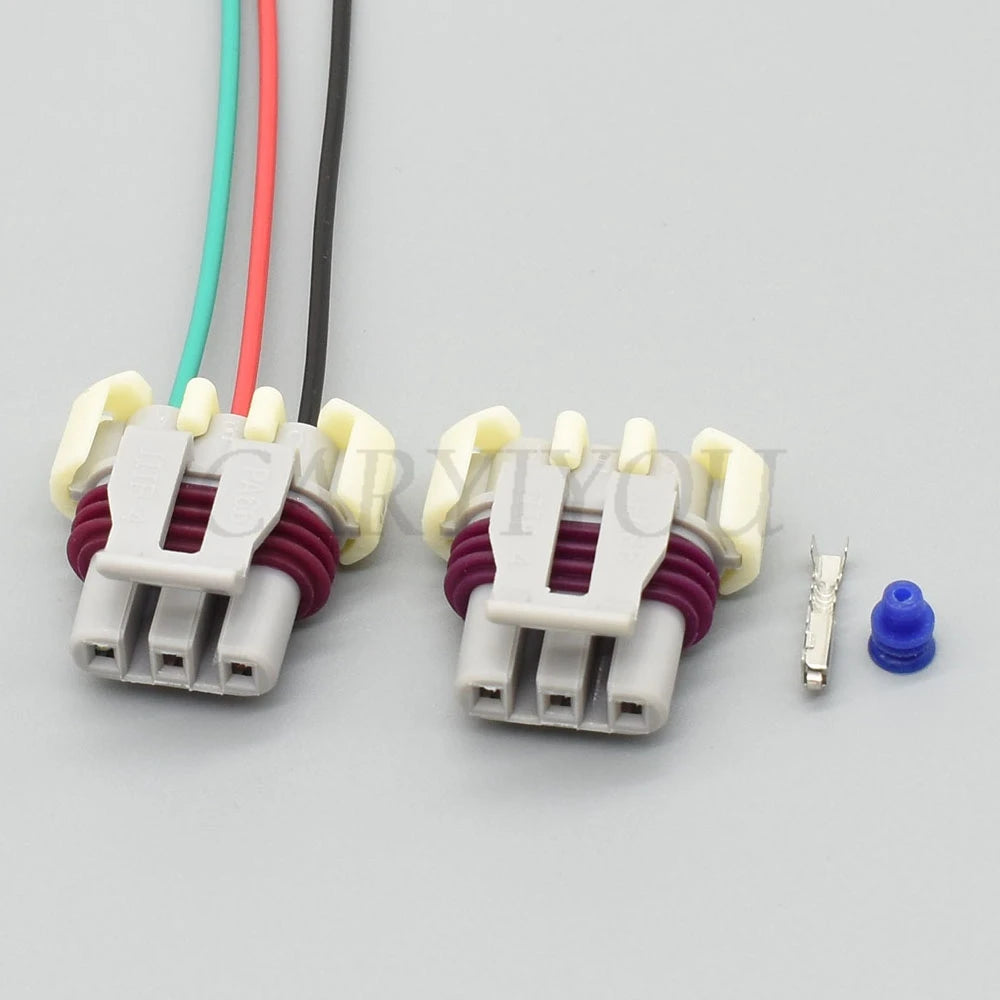 3-Pin female ignition coil connector 121209946 installed in Buick and Chevrolet wiring harness showing secure fit