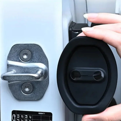 Silicone shock absorber installation for car door latch protection