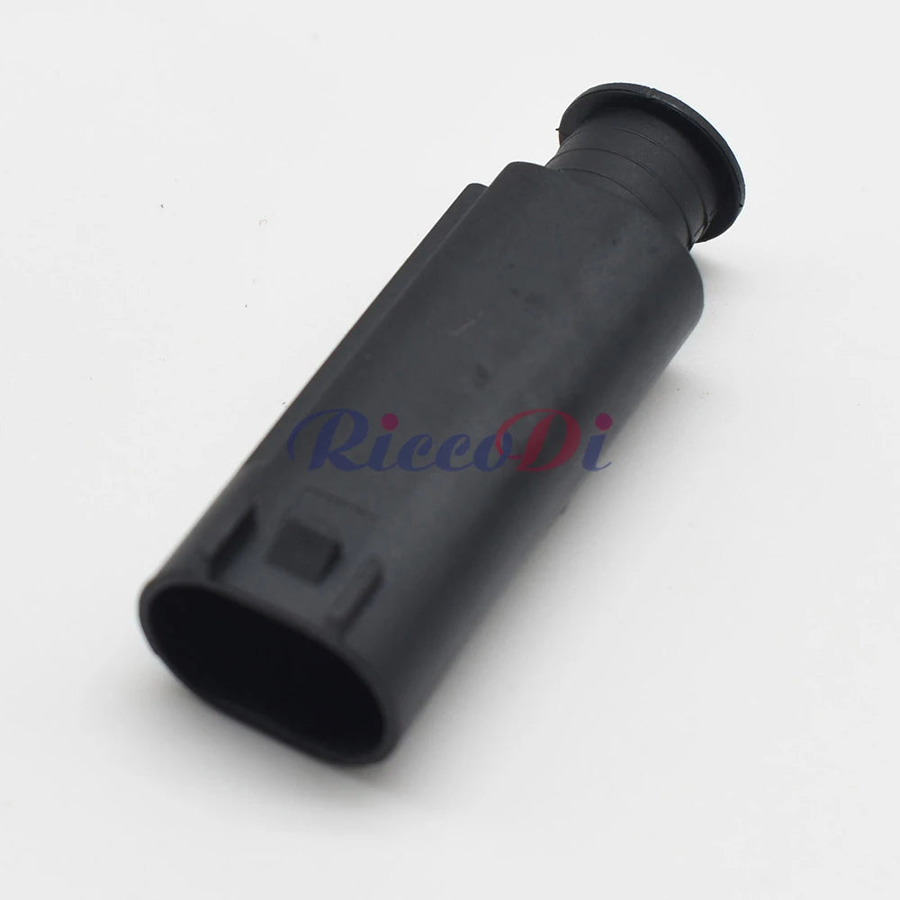 Car electrical plug showing precision terminals for reliable signal and power transmission