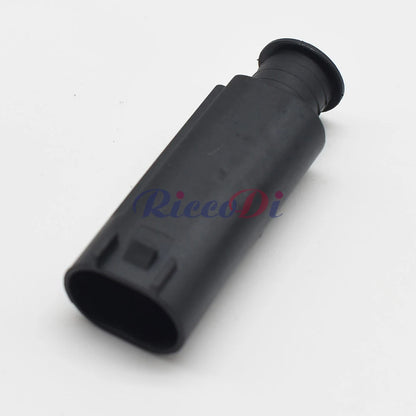Car electrical plug showing precision terminals for reliable signal and power transmission