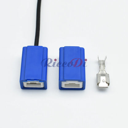 Ceramic H1 lamp socket showing precise terminal and contact design for stable heavy current wiring