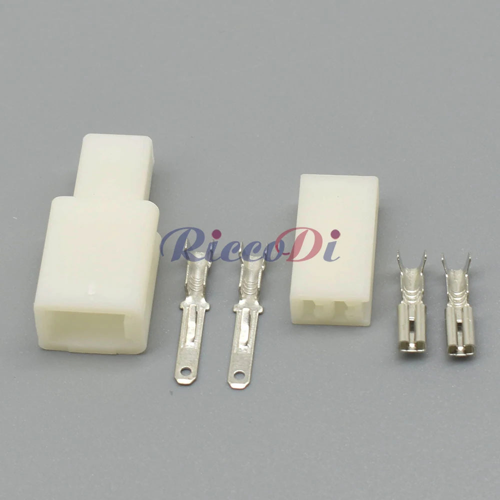 Close-up of terminals on 2.8 series automotive compressor wire connector for secure electrical connection