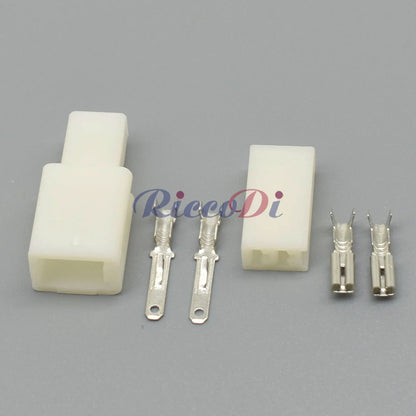 Close-up of terminals on 2.8 series automotive compressor wire connector for secure electrical connection