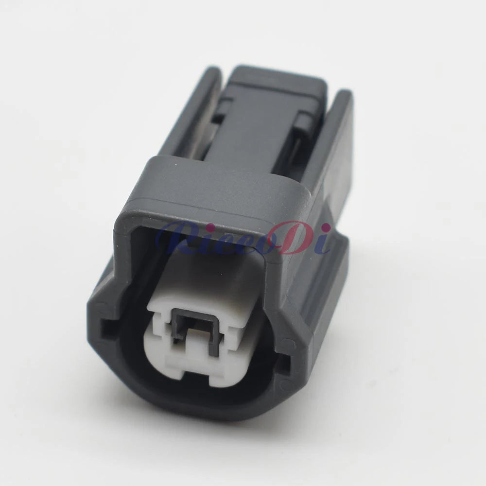 2.3mm automotive electrical plastic housing plug 6098-2329 installed in vehicle wiring harness for secure and efficient electrical connections