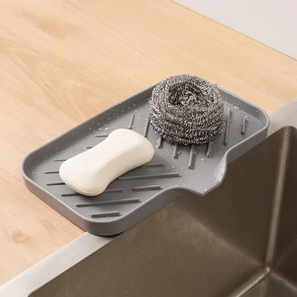 Faucet mat with soap tray and sponge drain pad, prevents sink splash and organizes countertop items