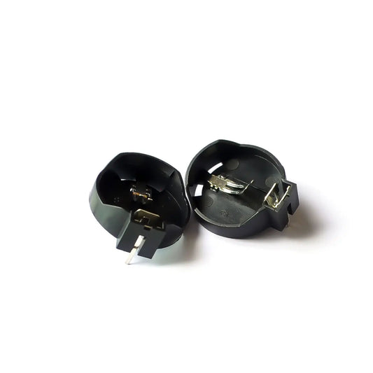 CR2032 DIP battery holder socket case in black for button cell coin batteries, suitable for ICs and electronic projects