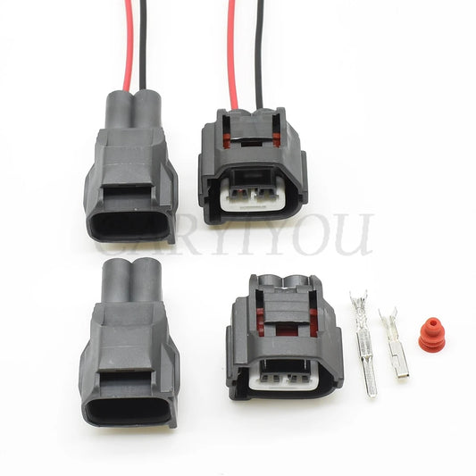 Close-up of terminals for 2 pin crank and cam position sensor connector plug