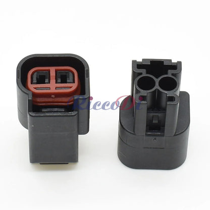 Close-up of 2 pin dashboard center speaker wiring harness connector for precise automotive electrical connection