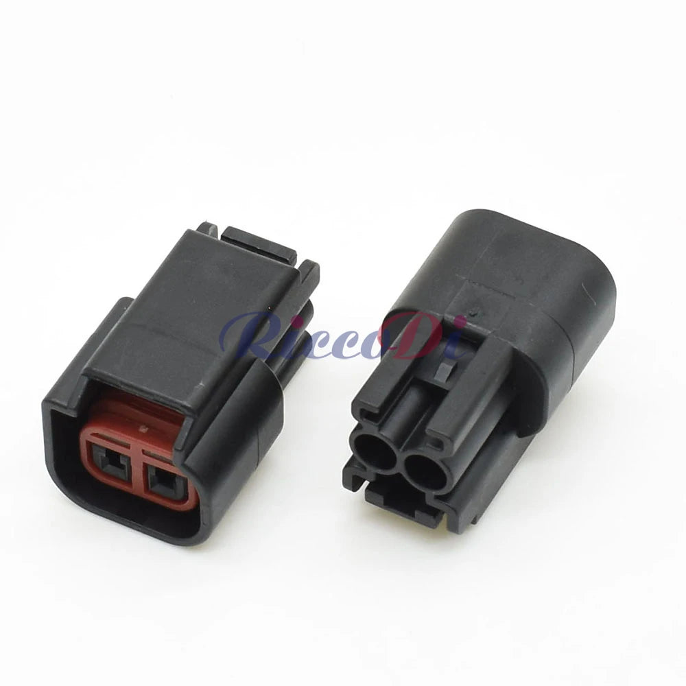 Terminal view of automotive dashboard wiring harness plug displaying reliable contact points for ignition coil