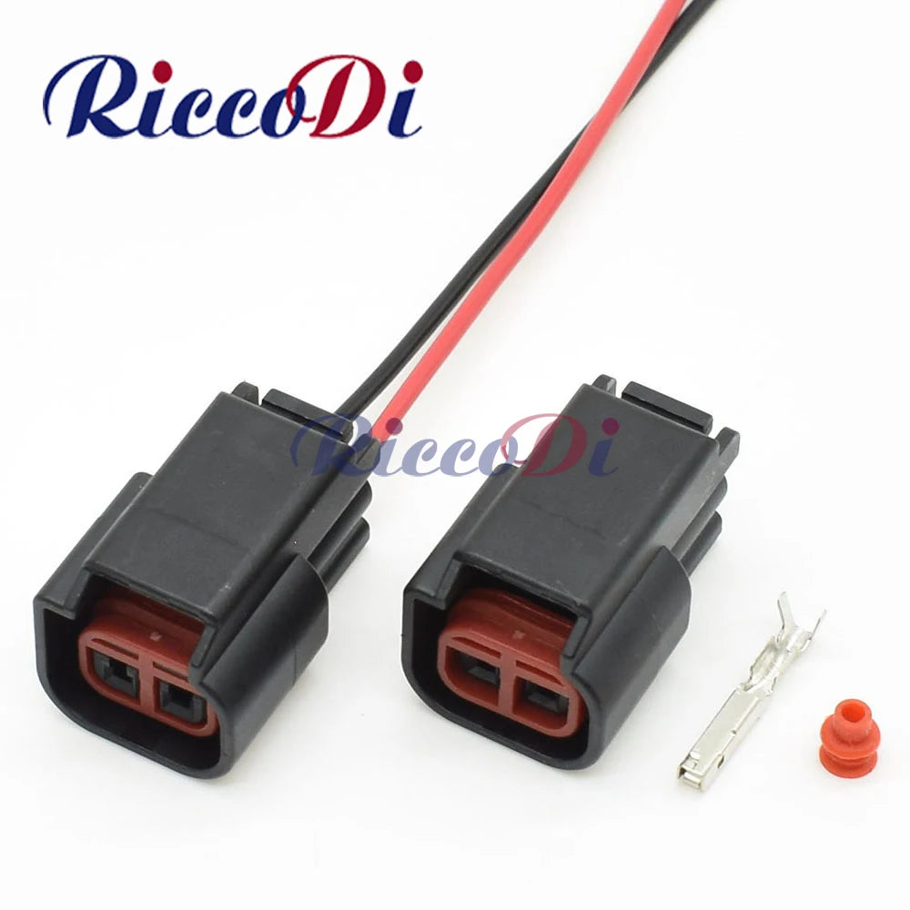 Front view of 2 pin automotive dashboard center speaker and ignition coil wiring harness connector plug