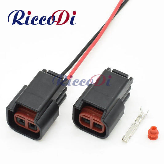 Front view of 2 pin automotive dashboard center speaker and ignition coil wiring harness connector plug