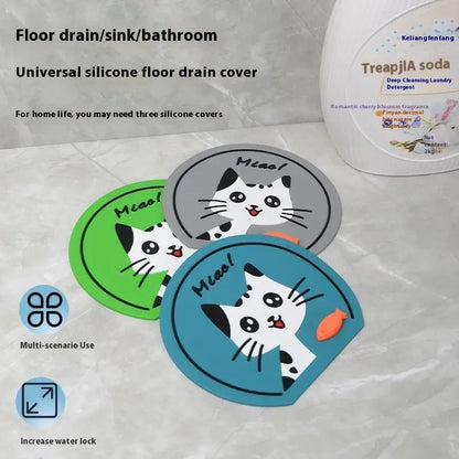 Detailed view of silicone seal drain deodorizer mat with cat frog pattern