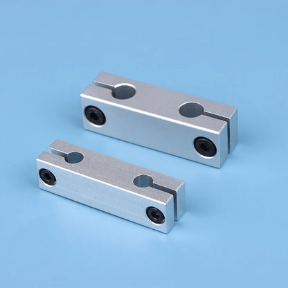 Pillar clamp with same diameter for fixing optical axis in round steel frames