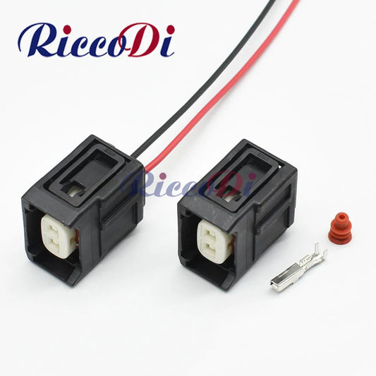 Automotive diesel fuel injector connector assembly with terminals for vehicle fuel systems