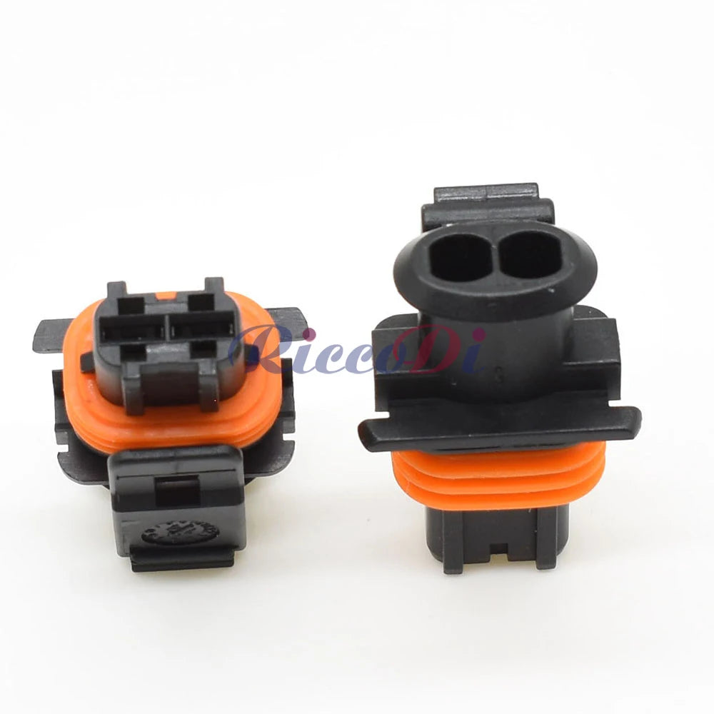 Side view of automotive diesel injector wiring harness connector showing pin alignment