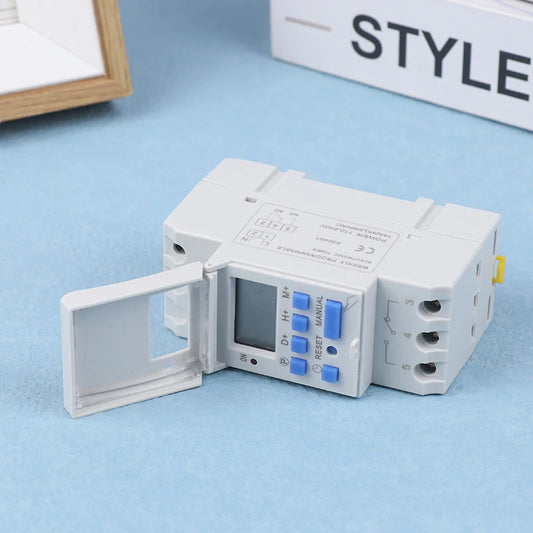Close-up of THC15A electronic digital timer switch for weekly 7-day programmable relay control, 220V 230V 10A 16A