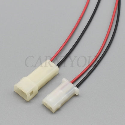 Demonstration of DJ3021 2-pin automotive connector fitting into car wiring harness