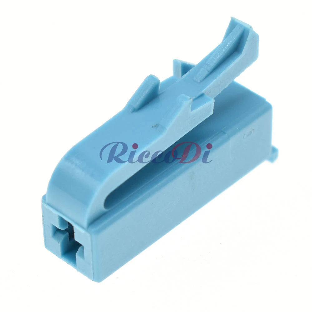 Demonstration of 3.5mm blue female automotive connector being installed in vehicle wiring harness