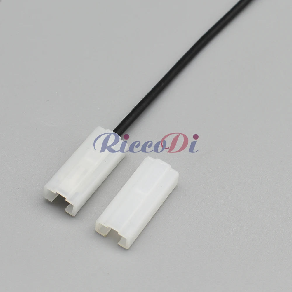 Installation of 6.3mm female wire connector in automotive harness showing secure wiring and terminal connection