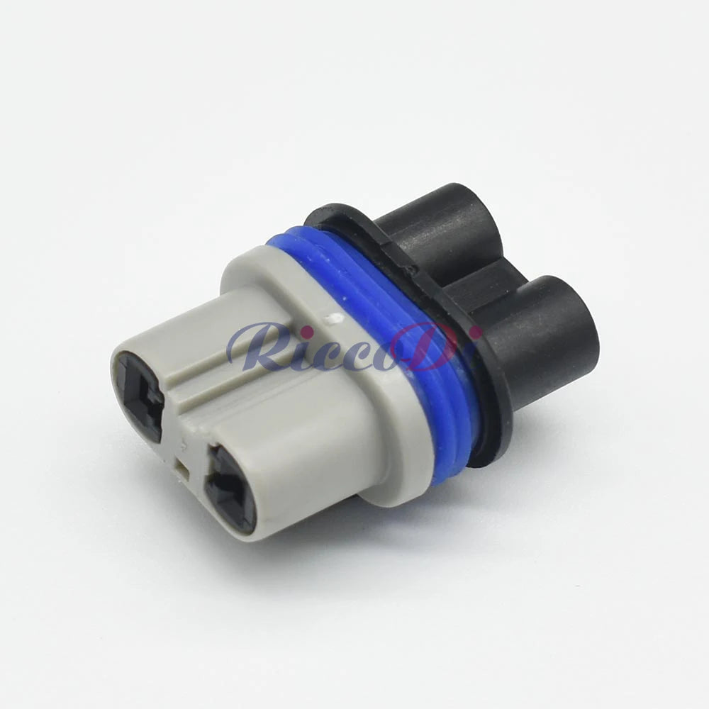Close-up of 2.8mm 2 pin male and female wiring connector for precise automotive connections