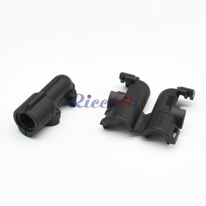 Close-up of 3.5mm 2 pin male and female wiring connector for precise automotive connections