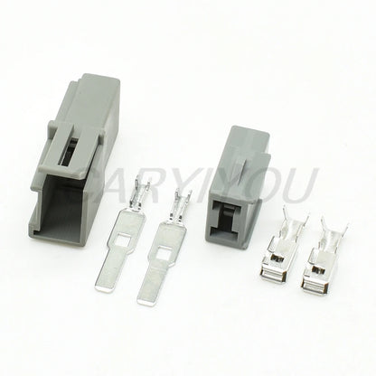 Demonstration of DJ70296-6.3-11 2 pin automotive connector plug fitting into car wiring harness for reliable performance