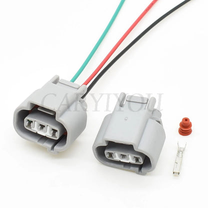 DJ7037FA-2.2-21 3-Pin automotive speed sensor connector installed in Toyota wiring harness showing waterproof cable socket connection
