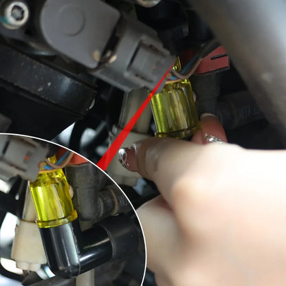 Elbow shaped motorcycle ignition spark plug cap for secure installation