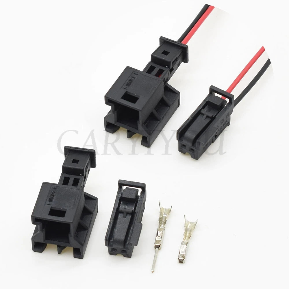 Detailed view of female and male interfaces in 2 way seat ventilation connector for secure wire harness connection