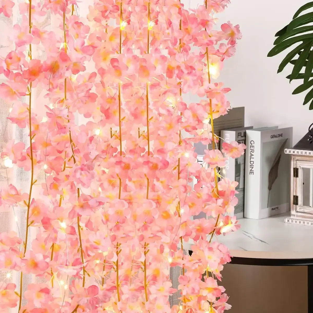Artificial flower vines LED string light close-up detail for party decor