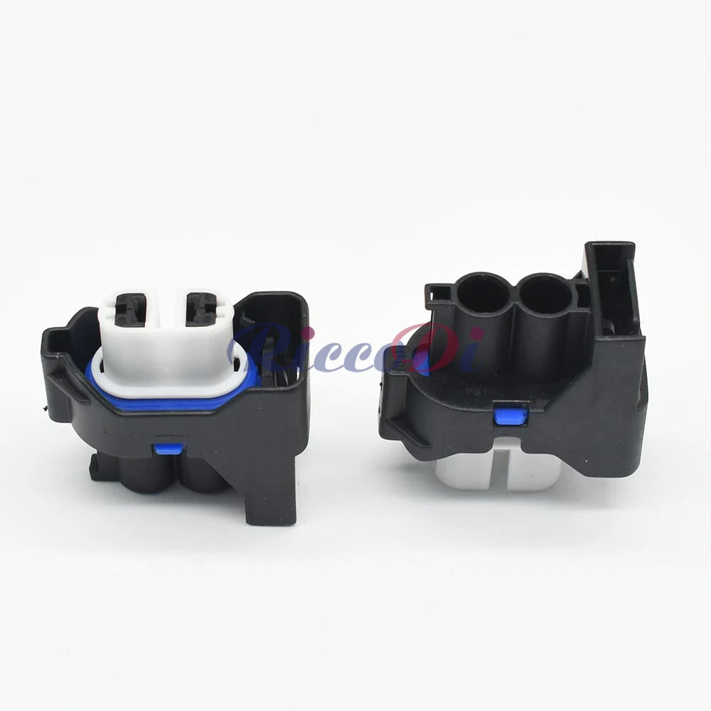 Side view of automotive fog light connector plug with rubber seals and pins