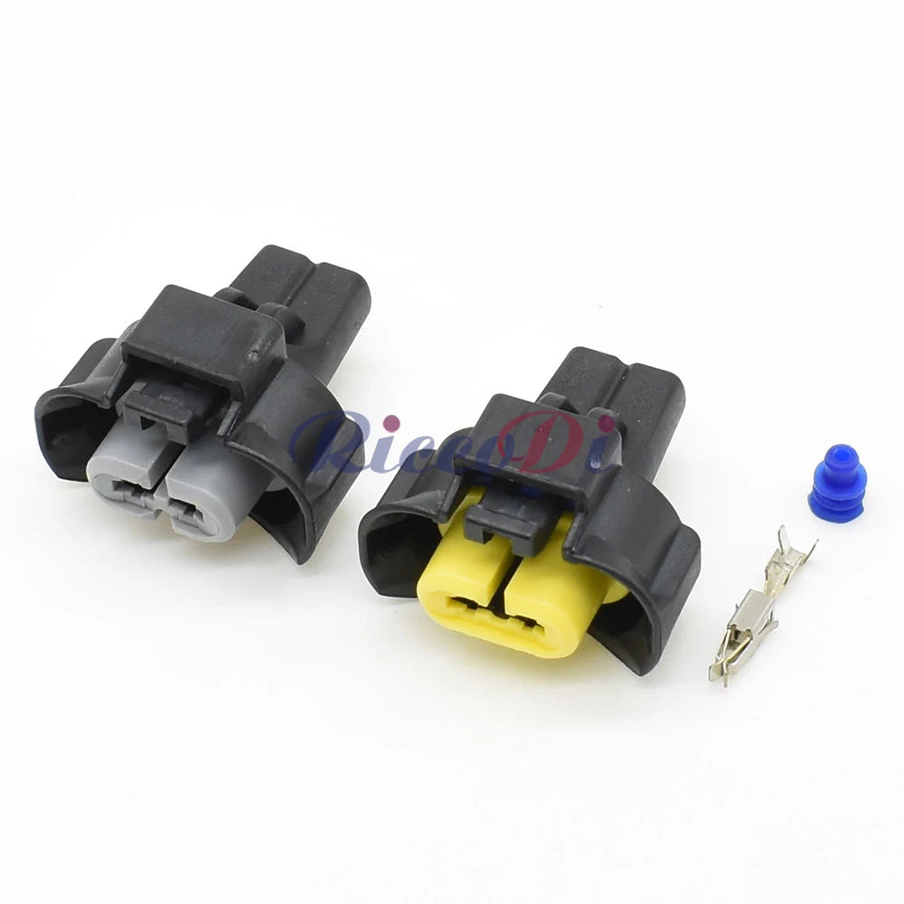 Close-up of 2 pin terminals for automotive fog light and headlight waterproof connector
