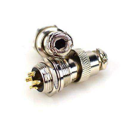 Close-up of GX16 circular aviation connector with gold plating, male and female 2-9 pins for electric wires