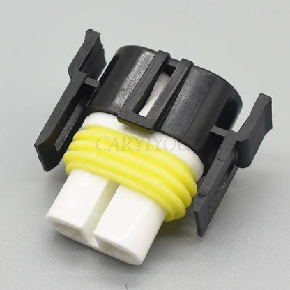 Detailed view of H11 2 pin sealed electronic wiring connector terminals for secure electrical contact