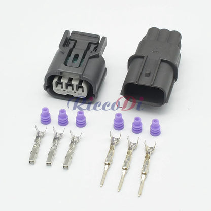 Close-up of 3 pin headlamp connector terminals 6189-0968 6918-1833 for automotive wiring