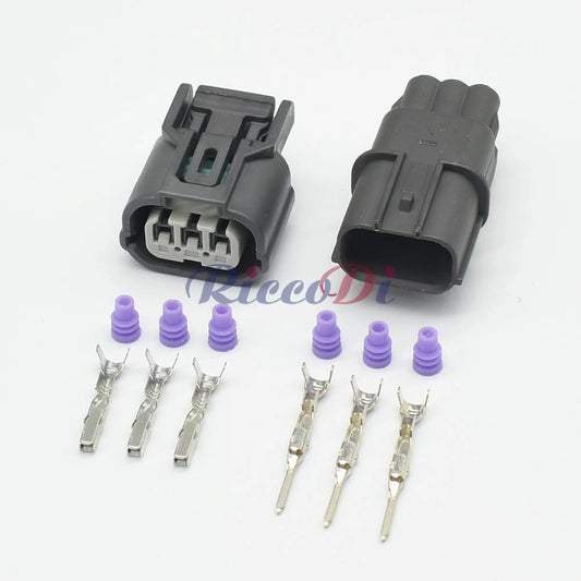Close-up of 3 pin headlamp connector terminals 6189-0968 6918-1833 for automotive wiring