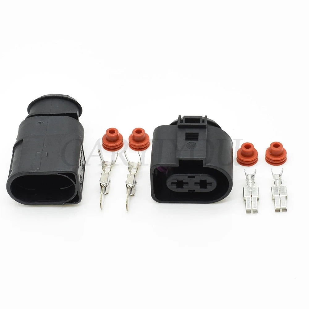 High durability automotive cooling fan connector housing for long term vehicle use