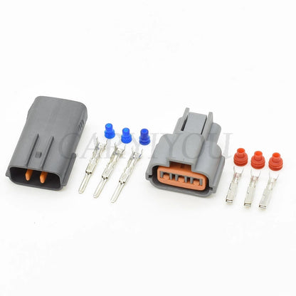 3-Pin PU465-03127 PU475-03900 high-voltage ignition coil waterproof connector installed in Mitsubishi engine showing secure car socket connection