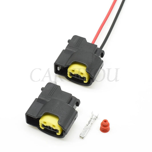 Front view of automotive ignition coil and horn connector plug 2 pin socket