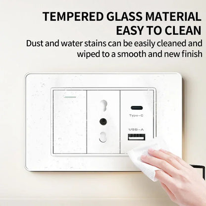 Close-up of T&I wall switch socket with Italy and Chile Schuko outlet, USB-C charging, tempered glass finish