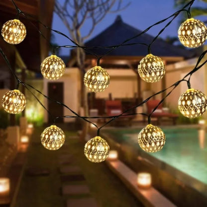 Detailed view of Moroccan iron ball LED lamp, solar-powered outdoor decorative string light