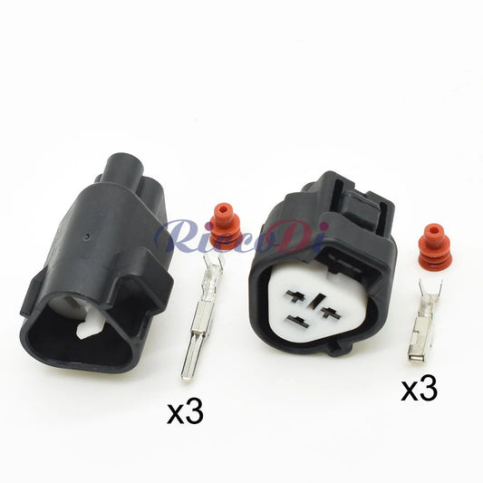 Close-up of 3-Pin terminals in automotive light socket motor connector 6189-0179 11016 for secure ignition coil connection