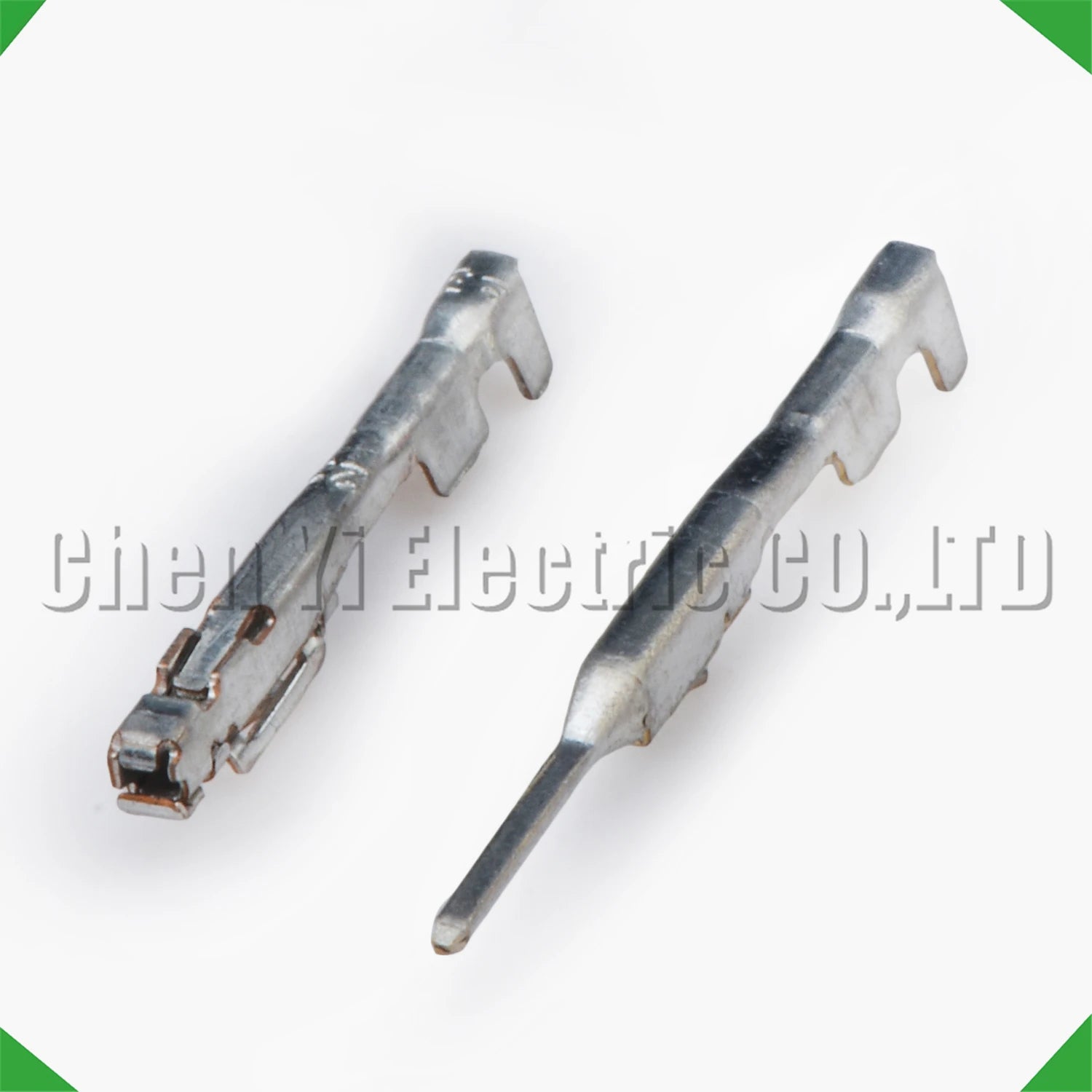 Close-up of 0.6 mm male and female wire crimp pins for automotive connectors